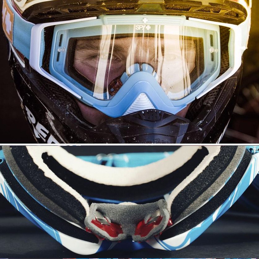 A rider in a motocross goggle, and the goggle's nose bridge fitted with magnets that pull the nose open